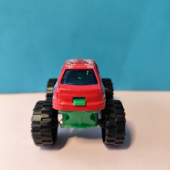 2/$12🍒Red Montater Truck With Blue And Yellow Flames - Picture 2 of 5